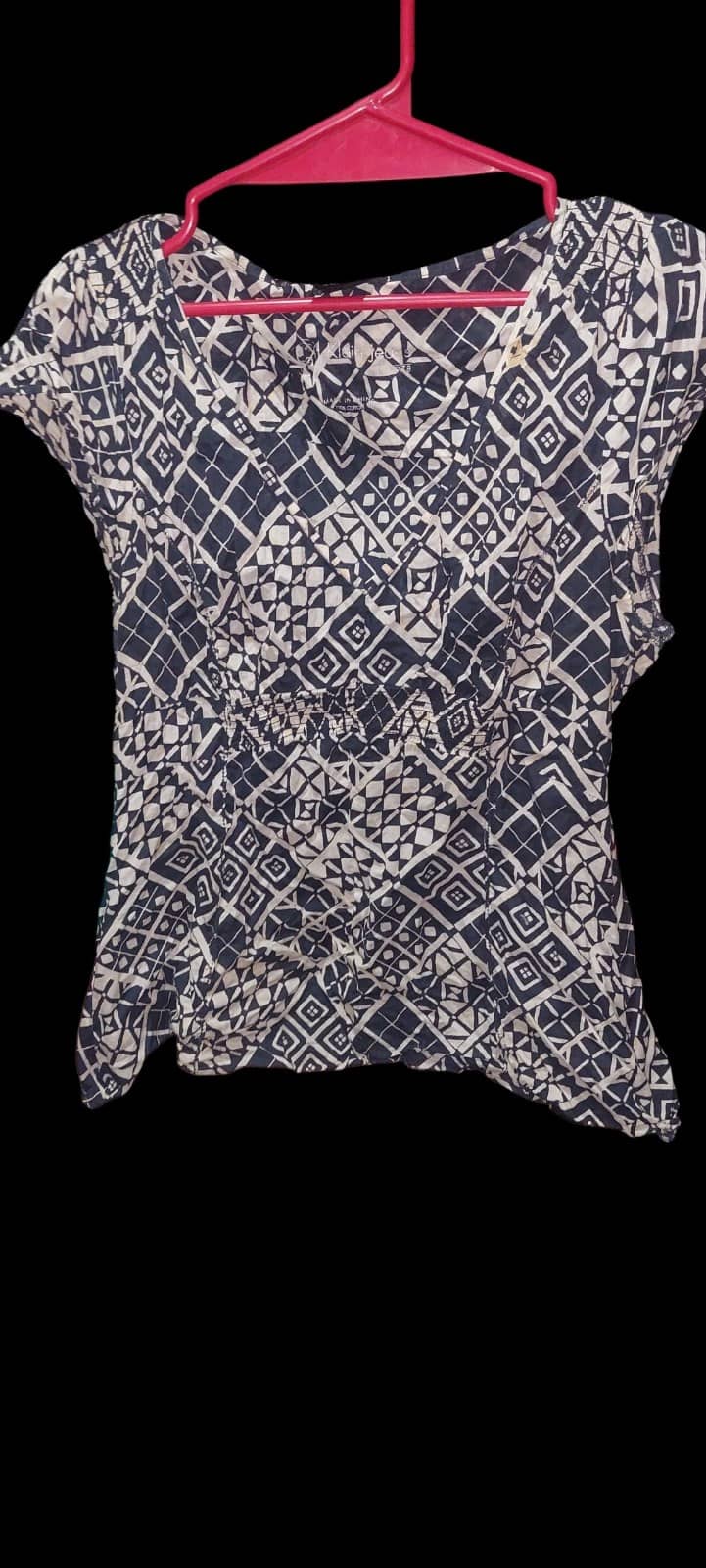 Blusa estampada geométrica