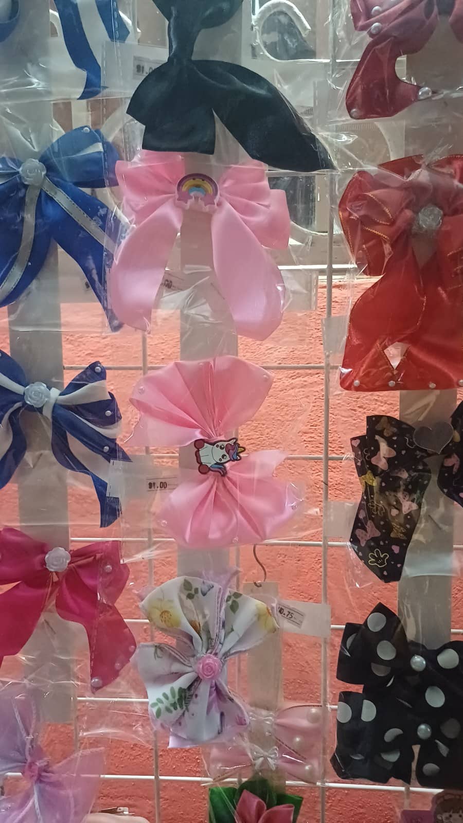Moño rosa con arcoíris