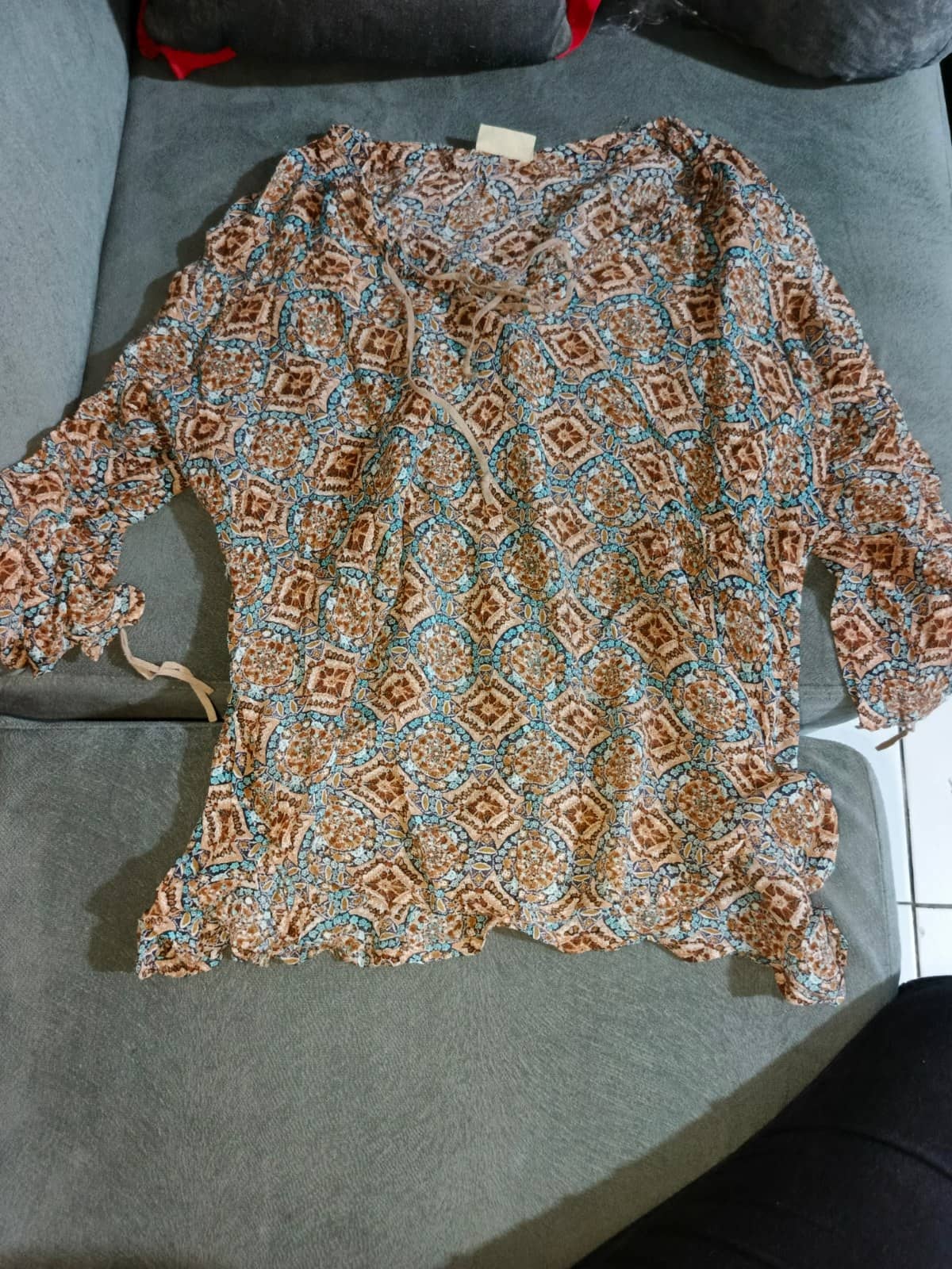 Blusa estampada manga larga