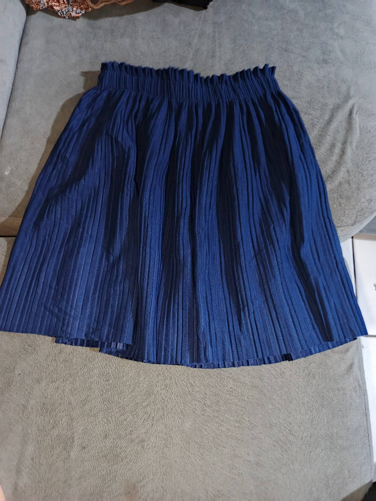 Falda plisada azul